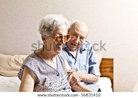 elderly couple in the bedroom