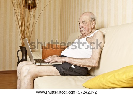 elder man with laptop