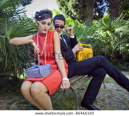 fashion portrait of retro sixties style young couple