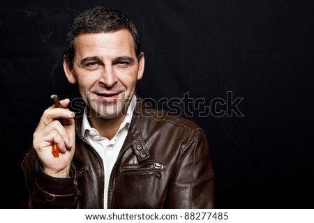 It was one of the wettest Pride parades in Dallas that I can think of. stock photo portrait of a cool mature man with leather jacket over black background 88277485 It was one of the wettest Pride parades in Dallas that I can think of.