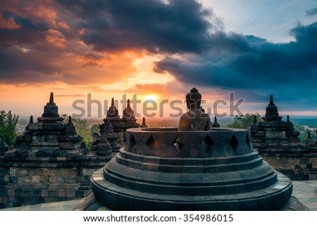 Dramatic and colourful sunrise seen from the Borobudur