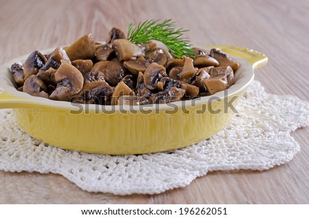 chopped and cooked mushrooms behind the plate