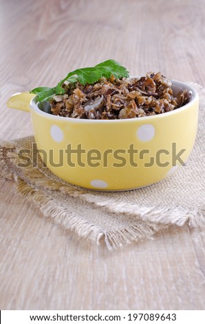 mushrooms finely chopped lying in the ceramic ware