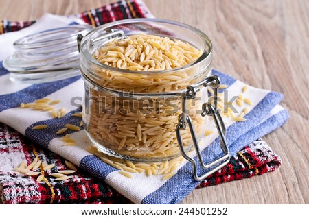 Pasta Orzo not prepared. Is in a glass jar.