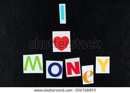 I love money written with cut out magazine letters.
