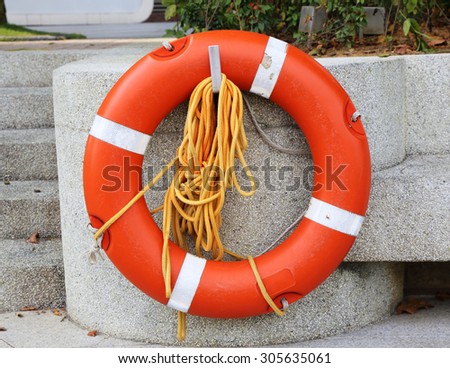 Life Buoy attached to a Stone tile Wall
