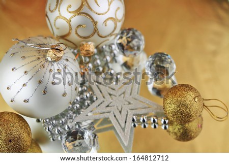 Christmas baubles, Cristal sphere and star golden background with reflections