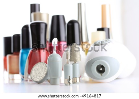 Manicure Set in front of nail polish bottles