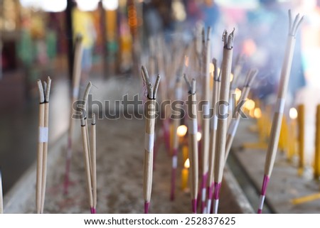 incense burner with background blur