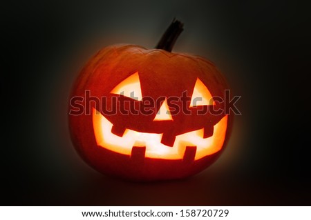 Halloween Pumpkin Jack O Latern on dark background