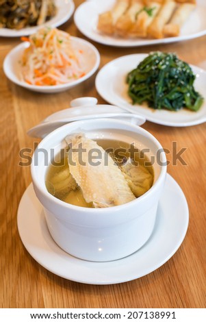 Cup of steamed chicken wing soup - chinese cuisine