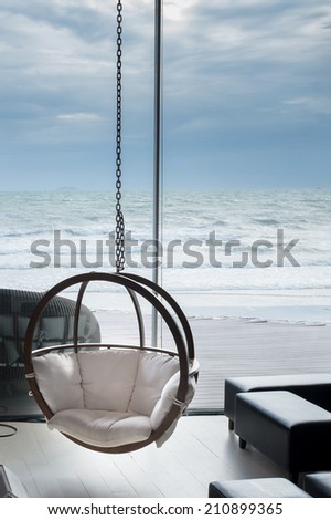 house near beach decorative with hanging chair