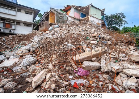 Ruined Building - Pieces of Metal and Stone are Crumbling from Demolished Building Floors