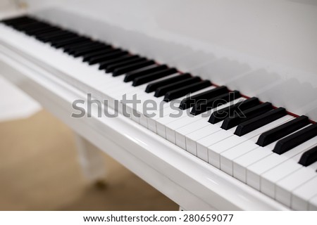 white classical piano keyboard finger pad in silent mode