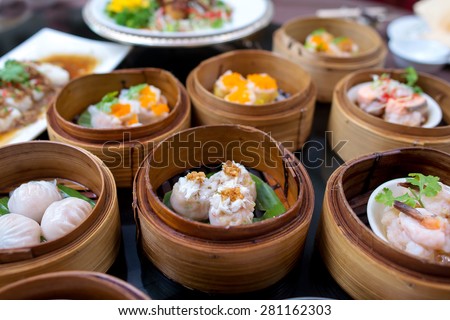 yumcha, various chinese steamed dumpling in bamboo steamer in chinese restaurant