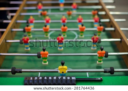 Table soccer from behind goal keeper command view angle
