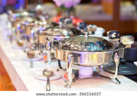 Kitchenware in the line catering buffet food  in luxury restaurant