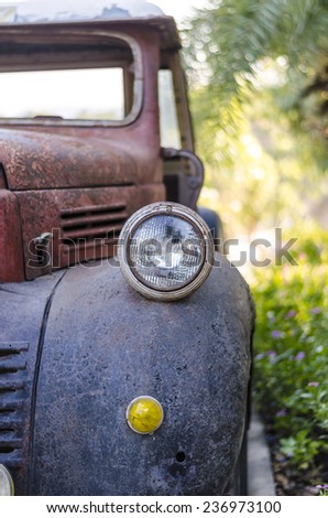 A head lamp of an old truck