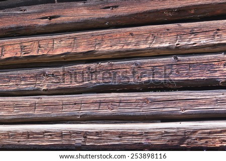 Old cabin logs, Brown and weathered.