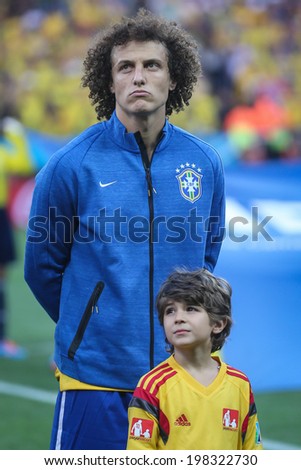 SAO PAULO, BRAZIL - June 12, 2014: David Luiz during the National Anthem at the FIFA 2014 World Cup opening game. Brazil is facing Croatia in the Group A at Corinthians Arena. No Use in Brazil.