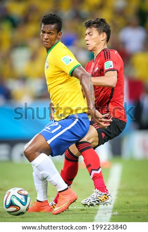 FORTALEZA, BRAZIL - June 17, 2014: Brazilian player competes for the ball during the World Cup Group A game between Brazil and Mexico at Estadio Castelao. No Use in Brazil.