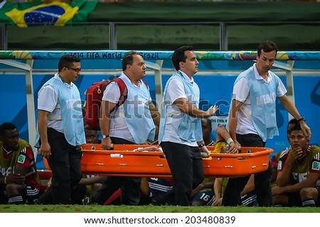 FORTALEZA, BRAZIL - July 4, 2014: Neymar of Brazil carried out of the field after being injured during the quarter-finals game between Brazil and Colombia at Estadio Castelao. NO USE IN BRAZIL.