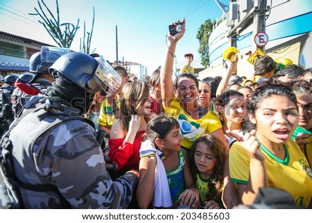 FORTALEZA BRAZIL - July 3, 2014: Fans standing outside the President Vargas Stadium during the Brazil team practice one day before the Quarter-Finals game against Colombia. NO USE IN BRAZIL.