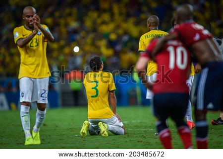 FORTALEZA, BRAZIL - July 4, 2014: Brazil players celebrate after Thiago Silva\'s first goal during the quarter-finals game between Brazil and Colombia at Estadio Castelao. NO USE IN BRAZIL.