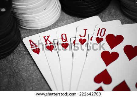 A winning poker hand of Hearts Royal Flush Cards, black and white background