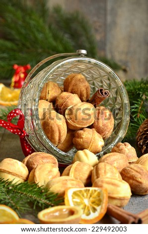 Cookies \'\'Nuts\'\' with sweeted condensed milk on festive background.