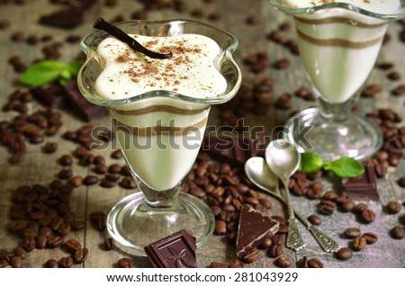 Vanilla pannacotta with coffee and chocolate - traditional italian dessert.