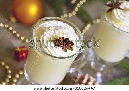 Eggnog -  hot christmas drink,traditional english cuisine.Tinted photo.