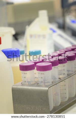 Close-Up Empty Laboratory Glass Flasks In Medicine Cartridge