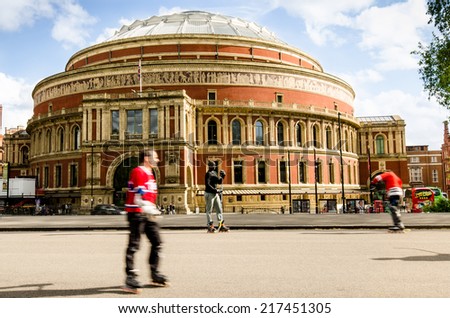 London, UK - April 26, 2014: Men play street hockey in front of the Royal Albert Hall wearing Montreal Canadiens hockey shirts