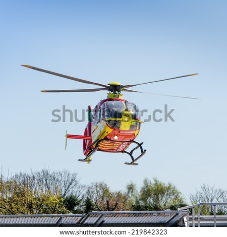 Southampton, UK - April 8, 2014: Air ambulance helicopter takes off from Southampton Hospital