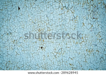 The texture of the old damaged walls with paint