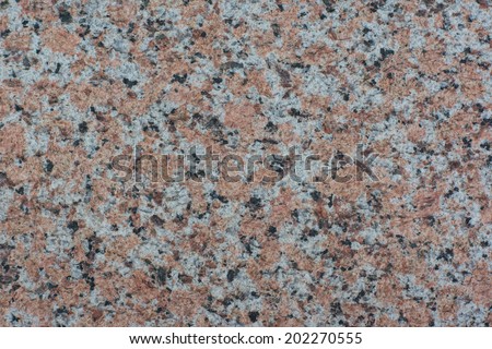 Close Up of The Granite Surface, with White, Red, and Black Colors