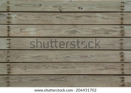 Wooden Planks With Columns of Nails on Both Sides