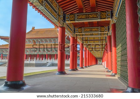 Corridor of A Confucius Temple and The Main Building of The Temple, Under Blue Sky. A  Stereo Type of Traditional Chinese Palace Architecture. The Temple is a Tourist Site in  Kaohsiung, Taiwan.