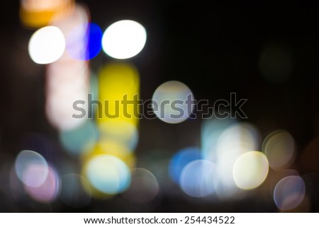 Abstract Background of Defocused Lights of Cars And Billboards of Stores , from A Busy Street of The Kaohsiung City.