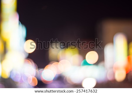 Abstract Background of Defocused Lights of Cars And Billboards of Stores , from A Busy Street of The Kaohsiung City.