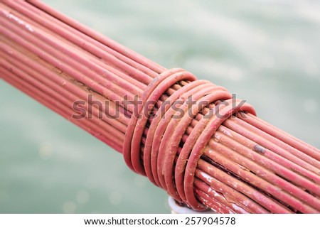 Close Up of A Bundle of Cables of  A Suspension Bridge, Painted in Red Color.