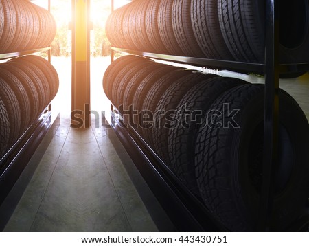 Tire rubber products , Group of new tires for sale at a tire store.