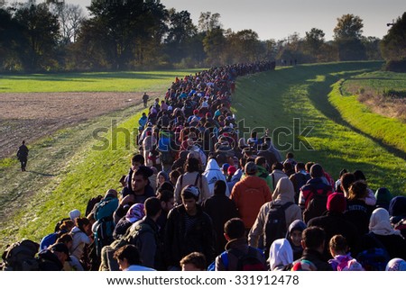 Several thousand refugees are wandering into the direction of Deutscland\
Dramatical picture from European refugees crisis\
see my collection from refugees\
25.10.2015 Slovenia Breznice;