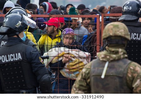 Austria builds a fence the Slovene border.\
Dramatical picture from Slovene refugees crisis\
Into Slovenia daily cca 10000 refugees arrive.\
see my collection from refugees\
25.10.2015 Slovenia Breznice;