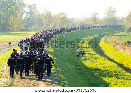 Austria builds a fence the Slovene border.\
Dramatical picture from Slovene refugees crisis\
Into Slovenia daily cca 10000 refugees arrive.\
25.10.2015 Slovenia Breznice;\
see my collection from refugees