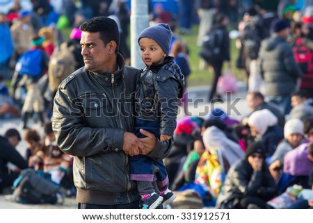 Austria builds a fence the Slovene border.\
Dramatical picture from Slovene refugees crisis\
Into Slovenia daily cca 10000 refugees arrive.\
25.10.2015 Slovenia Breznice;