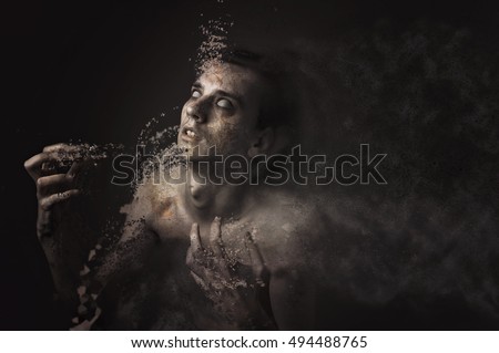 Dispersing agony, young man de-materializing in his agony, horror halloween concept