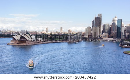 SYDNEY - MAY 11: View of Sydney and the Harbor on May 11, 2014 in Sydney, Australia. Over 10 millions tourists visit Sydney every year, making Sydney one of the world\'s top tourist destinations.
