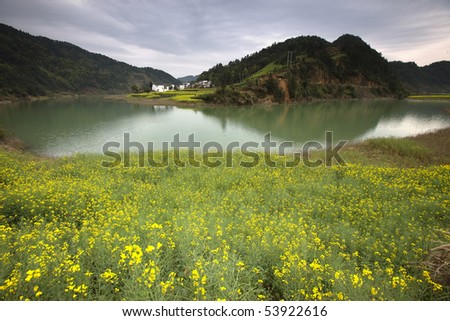 Peace lake scenery and a small village, China